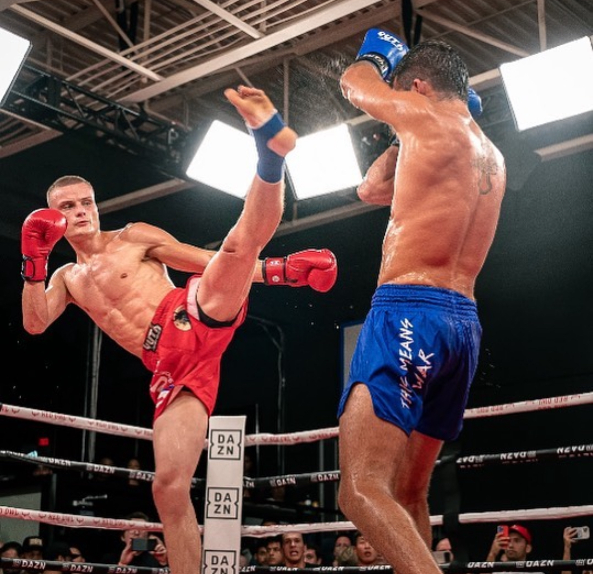 Thomas, a Muay Thai instructor, fighting on the ring